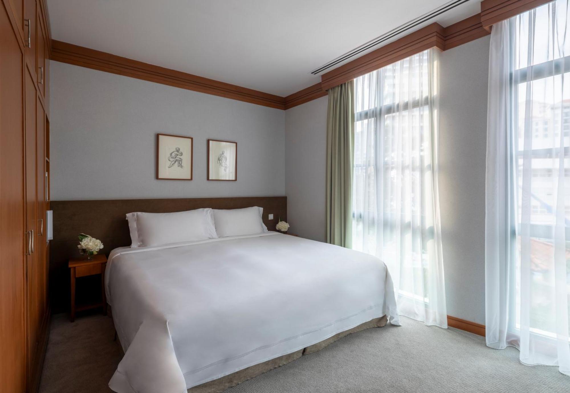 Fraser Place Robertson Walk Singapore Buitenkant foto A bedroom at The Hari
