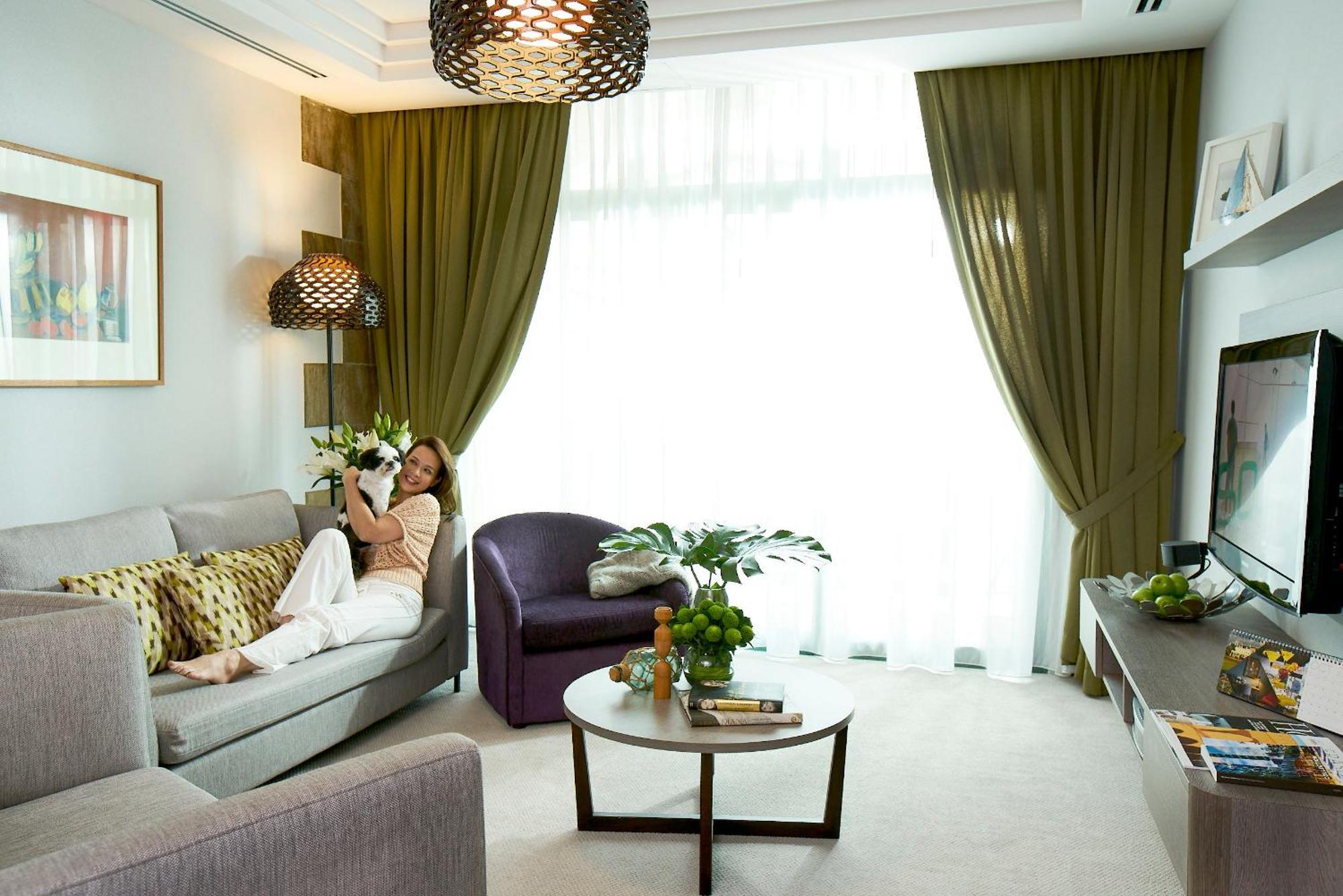 Fraser Place Robertson Walk Singapore Buitenkant foto A living room in a hotel suite